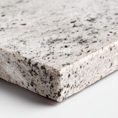 Close-Up View of Smooth Gray Stone Surface with Black Speckles