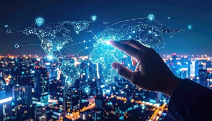 Hand touching an illuminated map of the world. Connections emanate above a blurred cityscape backdrop creating a sense of global connectivity