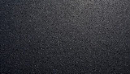 Top-down close-up of freshly laid asphalt with smooth dark surface
