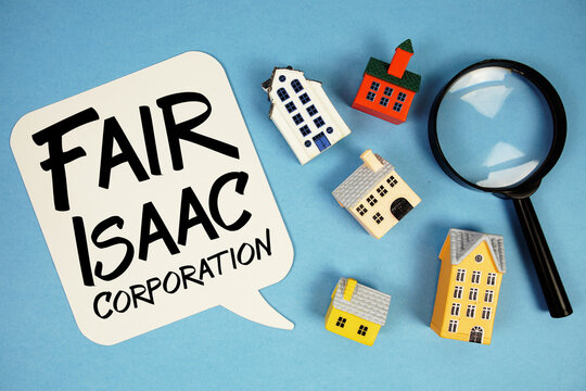 FICO Fair Isaac Corporation text with house models on blue background