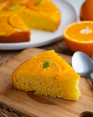 Orange upside-down cake. Delicious homemade sponge cake with organic orange slices.