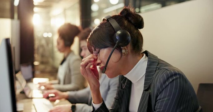 Team, woman and headache at computer in call center for bad sales service, night or telecom glitch. Coworking, agent and stress with headset for telemarketing issue, outbound crisis and global client