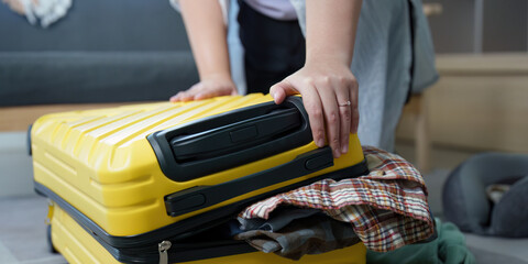 Closing Suitcase: Finalizing Packing for Travel