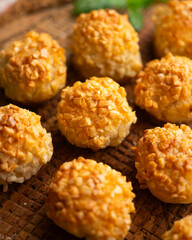 Panellets with pine nuts and almonds. A typical Catalan dessert made with marzipan and nuts.