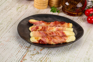 Hot mozzarella sticks with bacon