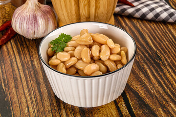 Baked white canned beans in the bowl