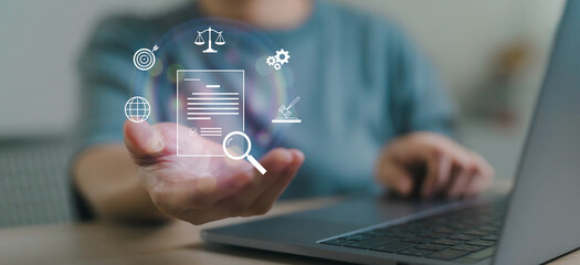 Legal document analysis and compliance review concept with digital law and laptop user, online auditing, contract checking. Legal technology solutions and digital document compliance review concept.