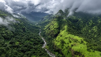 Verdant valley carved by a winding river, shrouded in mist.  Towering mountains and lush forests
