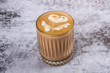 Hot cappuccino coffe in the glass