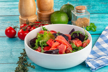 Salad with salmon and arugula