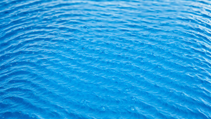Obraz premium Blue Water Surface with Waves