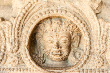 artistic stone carving on antique sculpture indoor