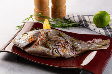 Baked dorada fish with spices