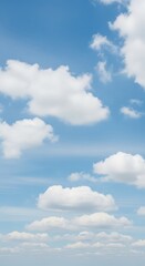 Obraz premium Bright blue sky with fluffy white clouds and soft sunlight