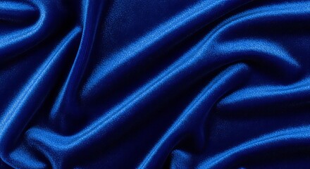 Fototapeta premium Elegant royal blue satin fabric with flowing folds, perfect for fashion design, luxury backgrounds, or creative projects