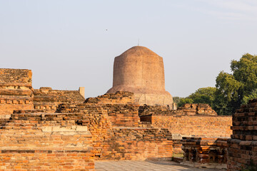 ancient buddhist dhamek stupa at sarnath with clear blue sky