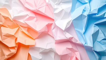 Close-up of crumpled paper in various pastel hues, featuring shades of peach, white, pink, and light blue, creating an abstract textural background