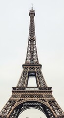 Iconic eiffel tower in paris with clear sky and architectural detail