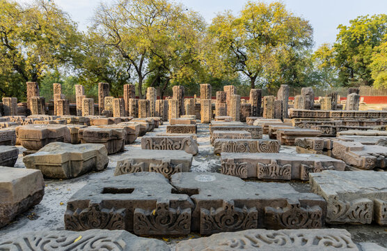 sarnath archaeological site with excavated ancient stone ruins at in daylight