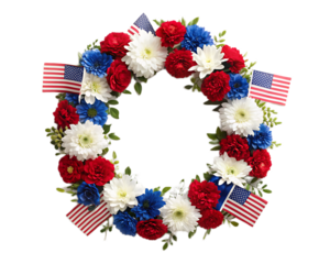 A patriotic wreath with red white and blue flowers and american flags on a white background surface