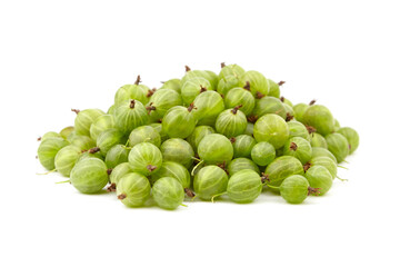 Fresh green gooseberries piled together, showcasing their smooth skin and vibrant color, highlighting their natural beauty and appeal for culinary uses and healthy eating concepts