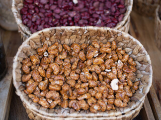 Golden Cashews and Crimson Beans in Wicker Basket