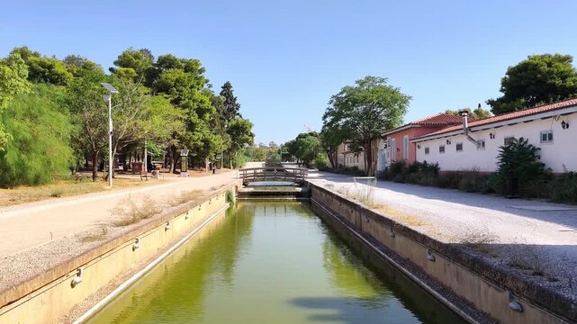 View of Antonis Tritsis Metropolitan Park in the municipaliy of Ilion, it is the largest park in Attica, Greece, featuring lakes, olive groves, scenic trails, a cafe, and a stone chapel. 