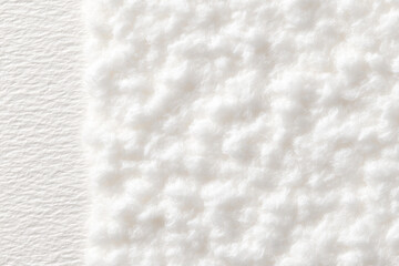 Snow entangled in washi paper fibers and fluff.