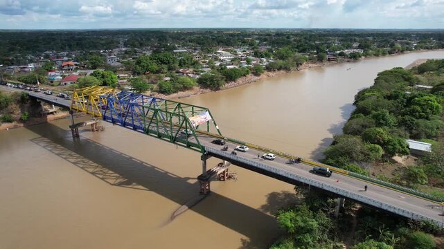 Bridge spans R&iacute;o Arauca near Elorza, Venezuela in tropical landscape