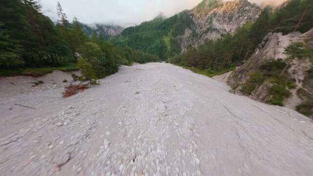 Dry mountain river and forest landscape in Ges&auml;use National Park, FPV drone