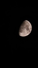 Close-up of a Half Moon with Visible Craters