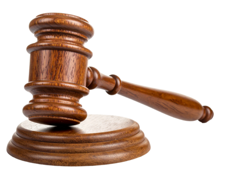 Wooden judge's gavel on a white background, close-up.
