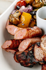 sausage with tomato and olives