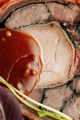 Gourmet Beef Slice Close-Up with Rich Sauce