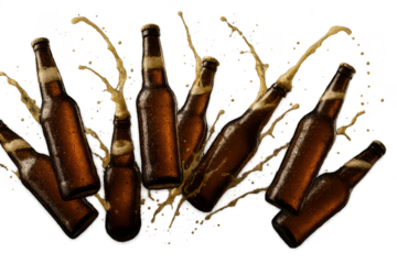 Dynamic splash of cold beer bottles isolated on transparent background, refreshing
