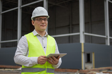 Engineer at a construction site. High quality photo