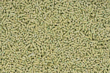 green tea animal litter. tofu animal filler background texture. close up. top view