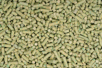 green tea animal litter. tofu animal filler background texture. close up. top view