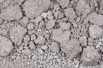 Texture of cracked concrete wall close-up. Damaged stone wall. Destroyed cement. crumbling stone