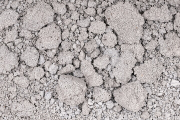 Texture of cracked concrete wall close-up. Damaged stone wall. Destroyed cement. crumbling stone
