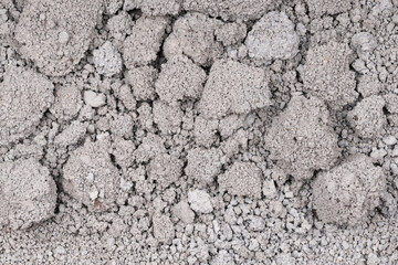 Texture of cracked concrete wall close-up. Damaged stone wall. Destroyed cement. crumbling stone