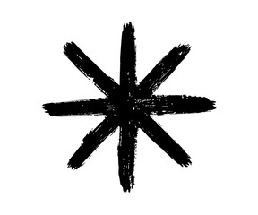 Black grunge starburst symbol brush stroke design