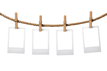 Four Instant Photo Frames Hanging on Rope isolated on transparent background, Clipart png