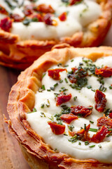 Mini Quiche perfect for brunch on black stone table