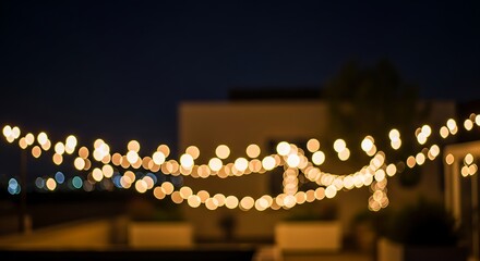 Warm celebratory string lights glowing against a dusky urban backdrop