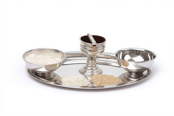 Naklejka premium Silver puja thali with diya, kumkum bowl, and rice grains, shiny polished finish, isolated on white and transparent background 