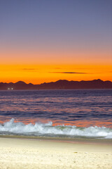 sunrise on Copacabana beach in Rio de Janeiro.