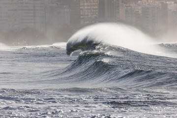 perfect wave at copacabana beach in rio de janeiro.