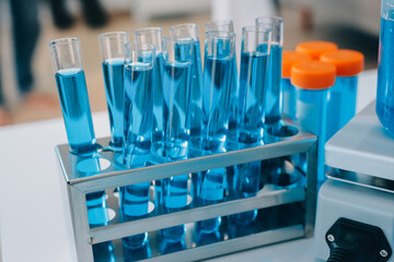 Collaboration, tablet or science with people in lab together for research or development. Innovation, tech and microscope with scientist team in clinical trial for planning or medical investigation