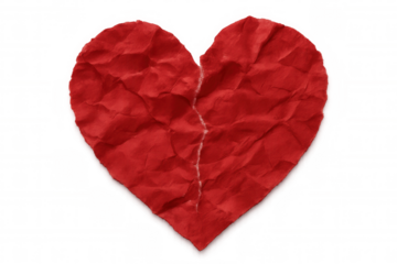 Red crumpled paper heart breaking apart on transparent background, representing heartbreak, divorce, and ending of relationships